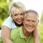 happy older man and woman feeling youthful