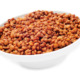 dry red lentils in white bowl