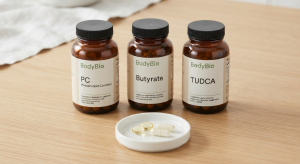 Comprehensive BodyBio FAQ guide featuring PC, Butyrate, and TUDCA supplement bottles for cellular health.